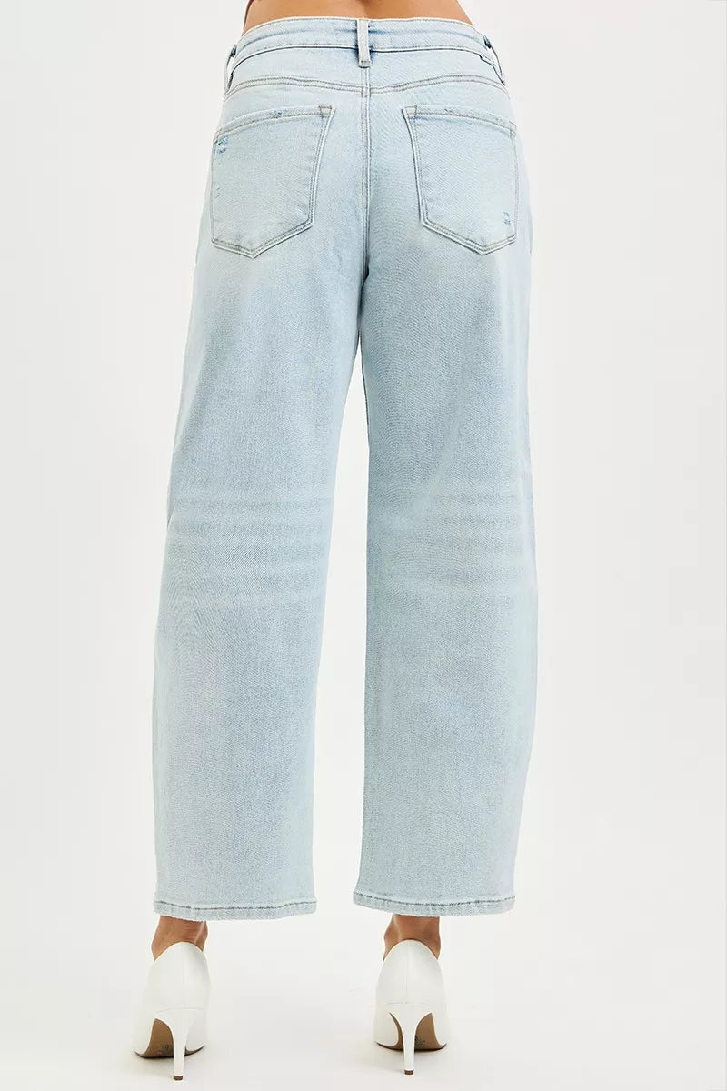 Light wash high-rise crop barrel jeans with back patch pockets and cropped wide leg