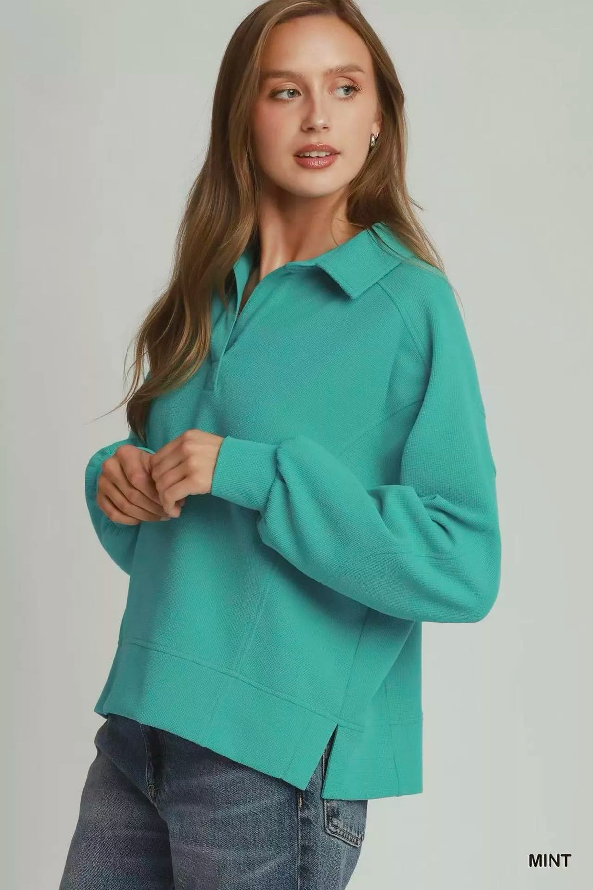 Mint brushed waffle polo pullover with collar and long sleeves, side view