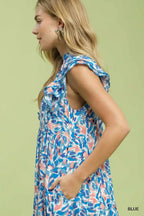 Blue tropical print tiered midi dress with ruffled cap sleeve and gathered bodice