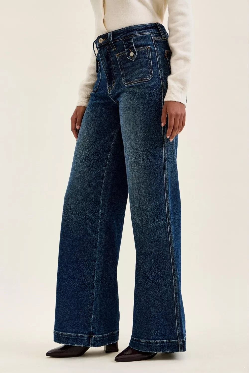 Dark faded indigo wide-leg jeans with patch pocket detailing and belt loops