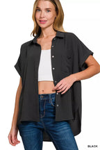 Relaxed black button-down blouse with short sleeves and chest pocket