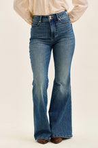 High-waist flare jeans in blue denim wash with front pockets, belt loops, button closure