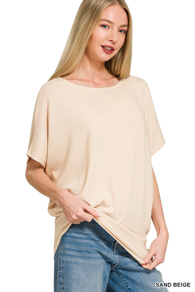 Sand beige dolman sleeve boat neck top, draped side silhouette