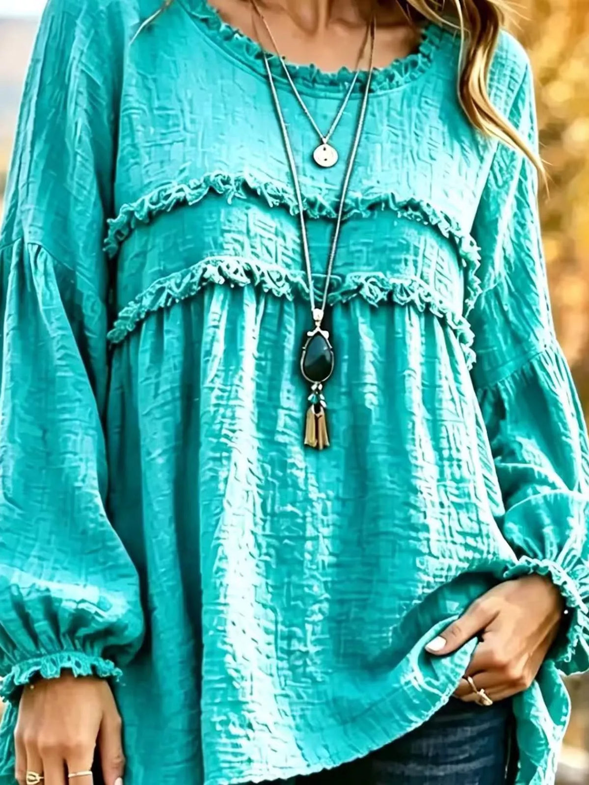 Teal frayed trim peplum blouse with tiered ruffle bands and gathered balloon sleeves