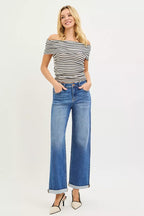 High-rise blue denim straight-leg jeans with cuffed hem and back pockets