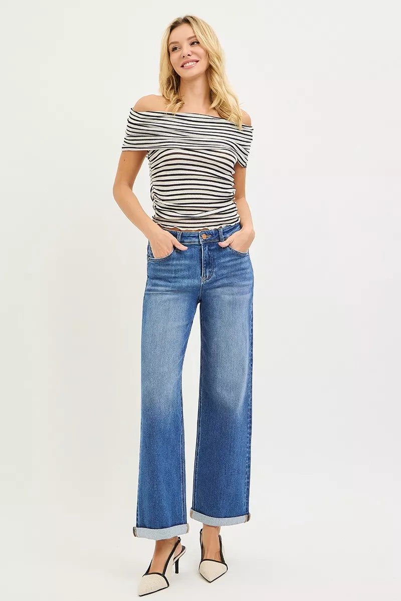 High-rise blue denim straight-leg jeans with cuffed hem and back pockets