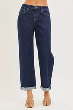 Dark blue cropped boyfriend jeans with cuffed hems and back yoke detail