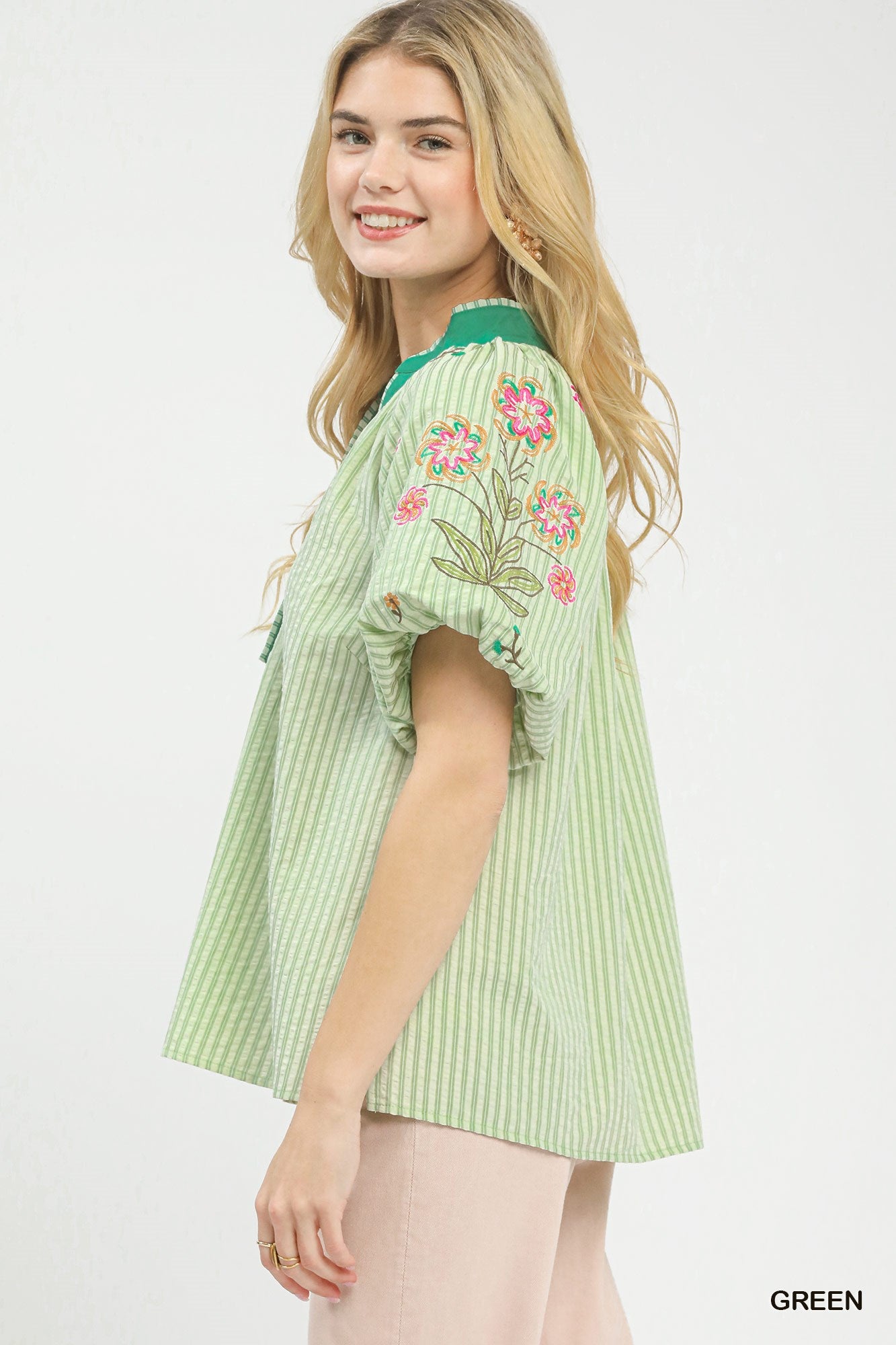 Green striped dolman top with embroidered floral puff sleeve, V-neck