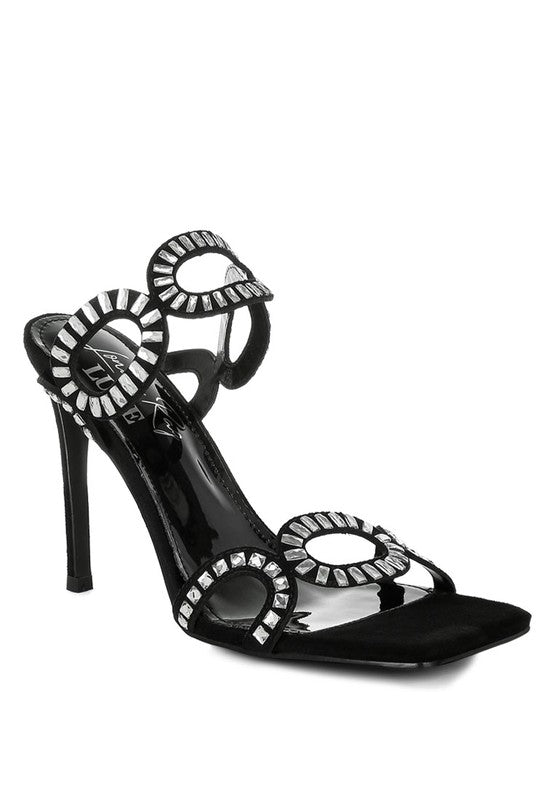 Black stiletto sandals with rhinestone circular cut-out straps and open toe, slip-on.