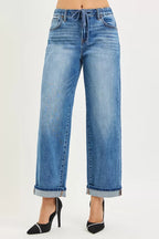 Medium-wash elastic waist slouch ankle jeans with cuffed hem and drawstring
