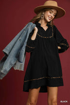 Textured Babydoll Dress with Leopard Trim Trendy & Playful Style