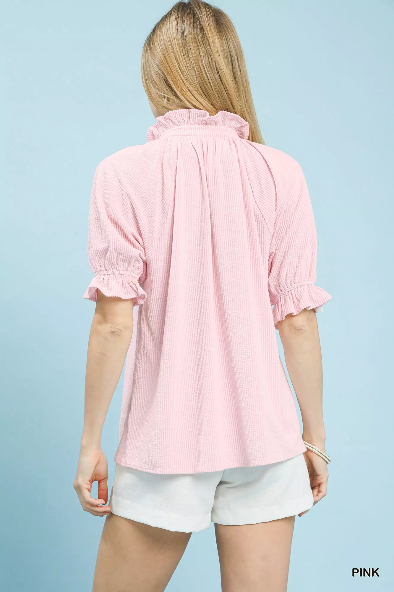 Pink textured blouse back with gathered ruffle sleeves