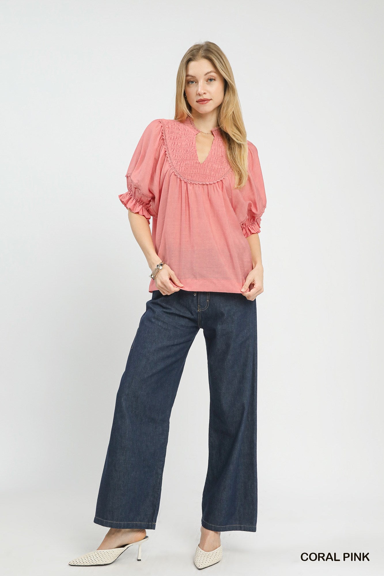 Coral pink blouse with smocked yoke and ruffle sleeves, relaxed fit