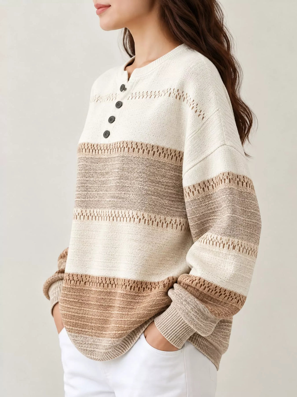 Tan and cream striped-knit henley sweatshirt with long sleeves, side view