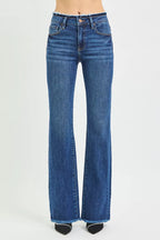 Women's mid-rise bootcut jeans in dark blue with classic five-pocket design