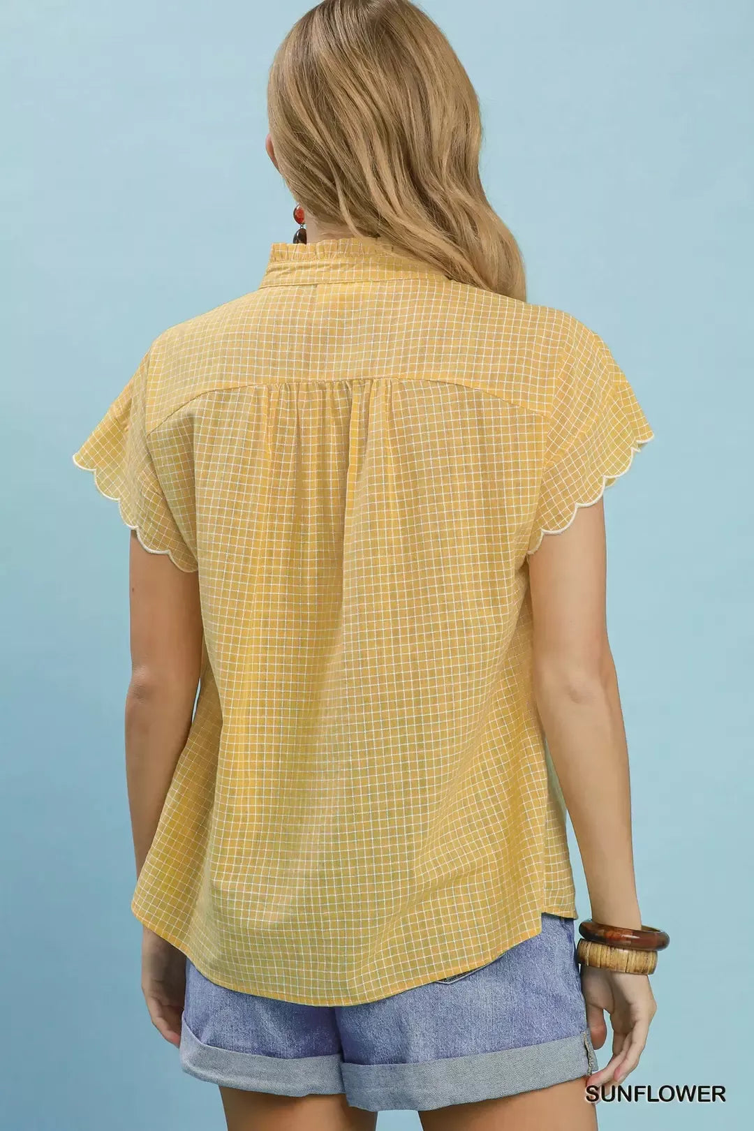 Sunflower embroidered plaid blouse back with scallop hem and button placket