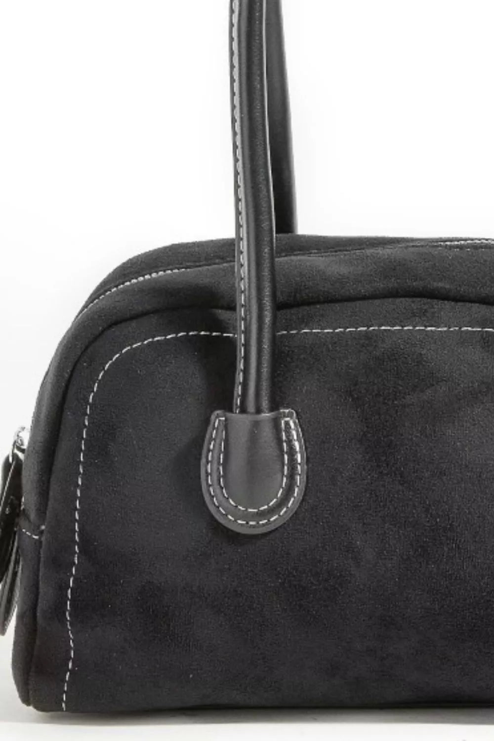 Black faux suede shoulder bag with stitched panel and rounded handle attachment