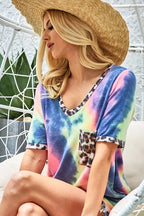 Women's multicolor tie-dye V-neck tee with leopard front patch pocket, close-up