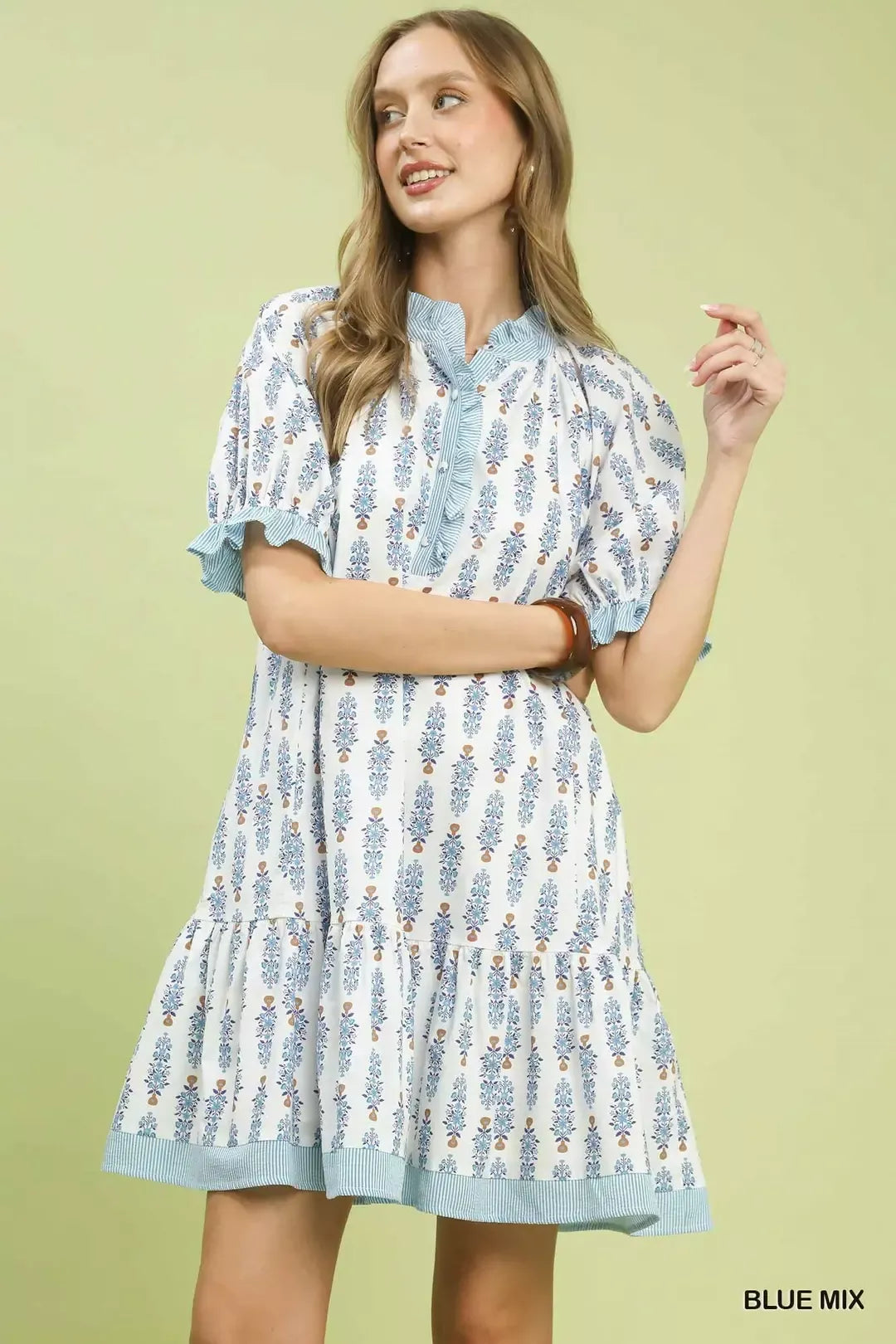 Light blue floral-print tiered mini dress with button front and striped trim