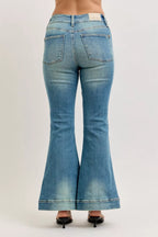 High-waist flare jeans with vintage wash, back pockets, and flared hem