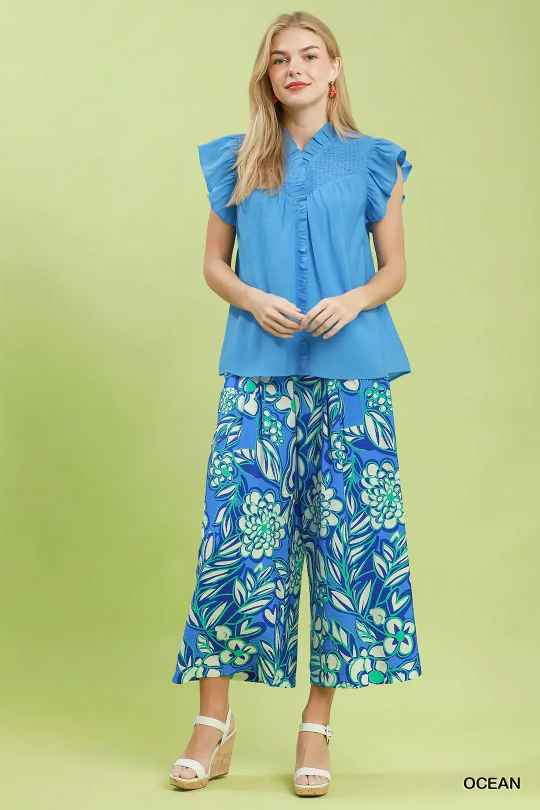 Ocean blue smocked yoke ruffle cap sleeve blouse with gathered front