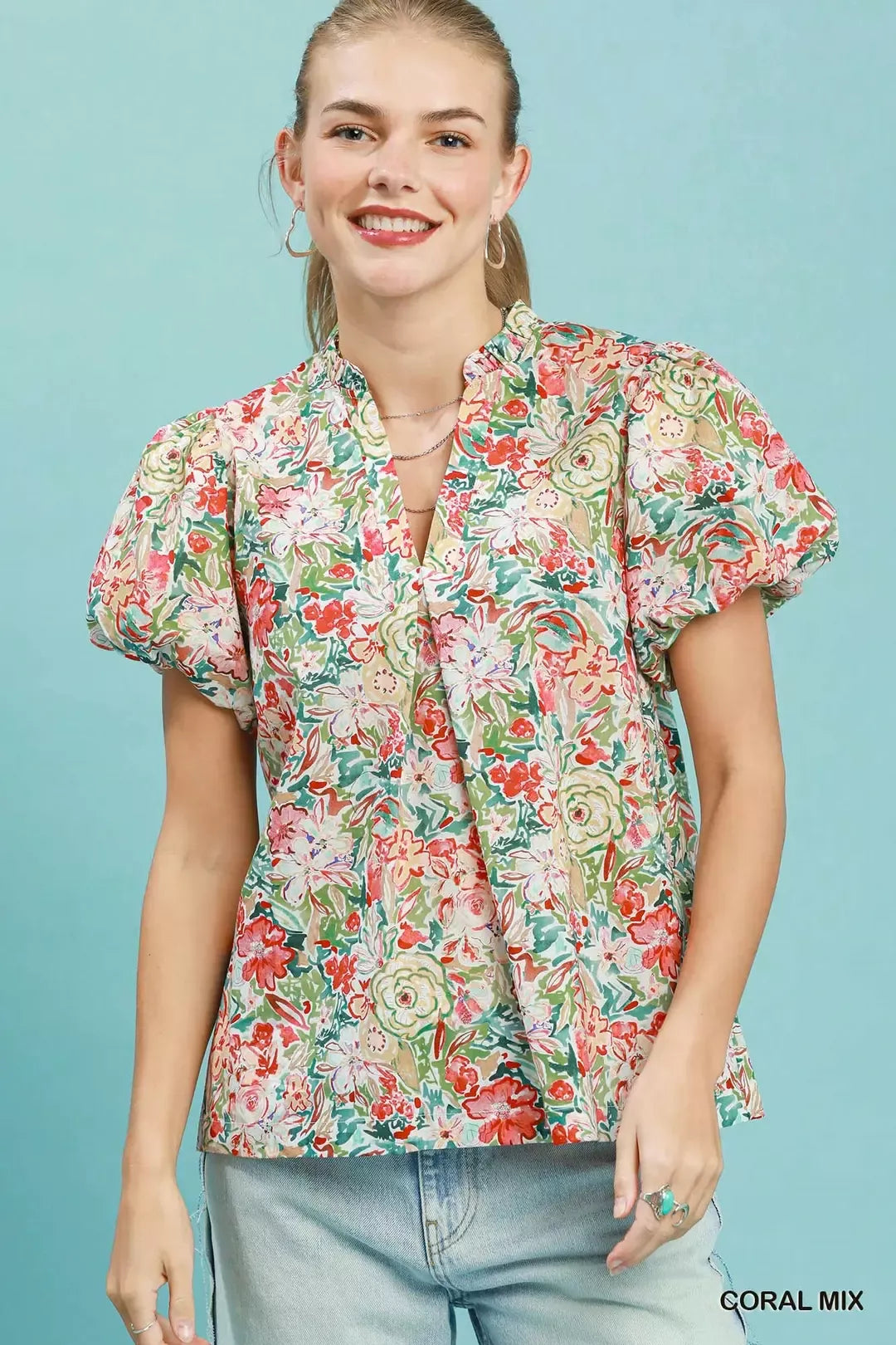 Floral puff-sleeve blouse in coral mix with V-neck and button front