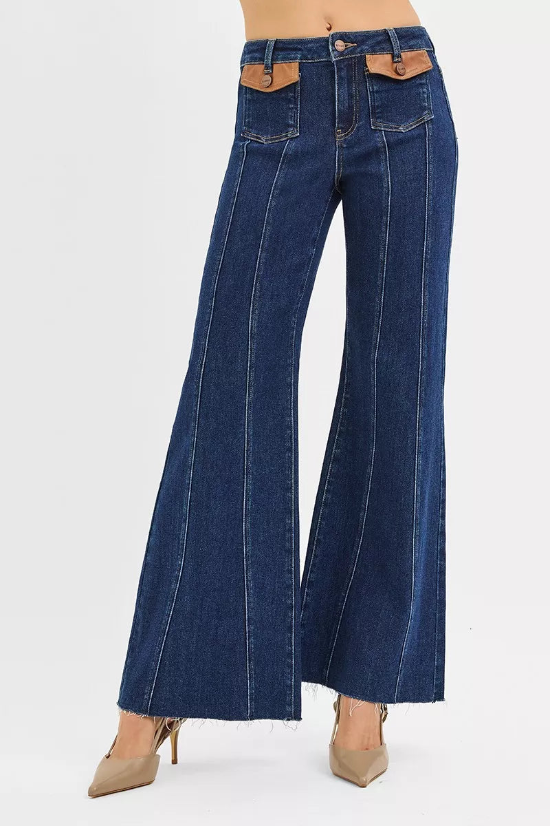 High-rise wide flare jeans, blue wash, front patch pockets with leather tabs