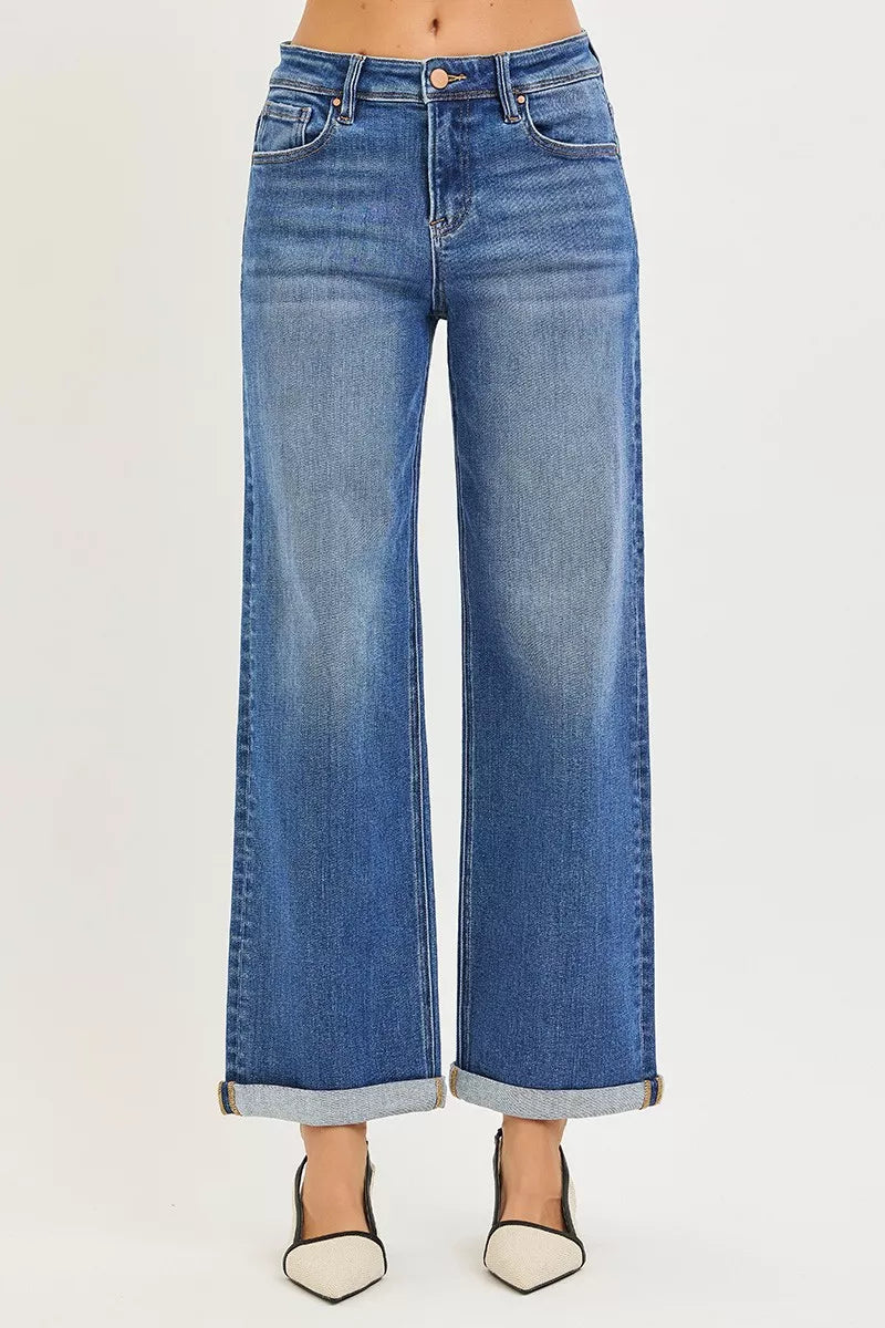 High-rise relaxed-fit blue straight jeans with cuffed ankle hem, front view