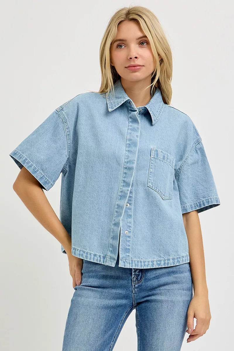 Light blue denim cropped half-sleeve shirt with button front and chest pocket