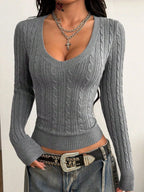 Gray deep V-neck cable-knit sweater with long sleeves and fitted waist