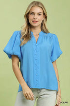 Ocean blue button-down puff sleeve shirt with collar and front button placket