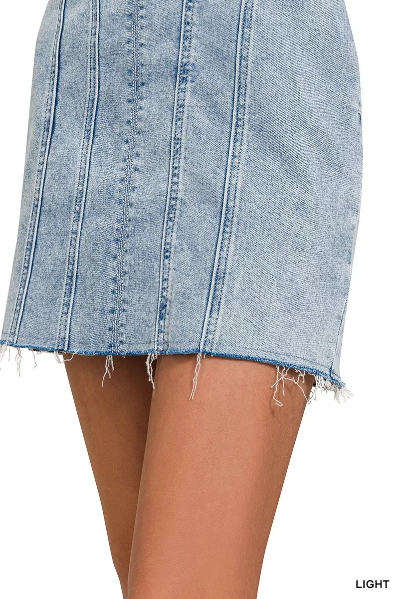 Light wash denim dress skirt with frayed hem and exposed seams