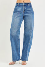 Medium-wash baggy jeans with button fly, belt loops, and relaxed straight legs