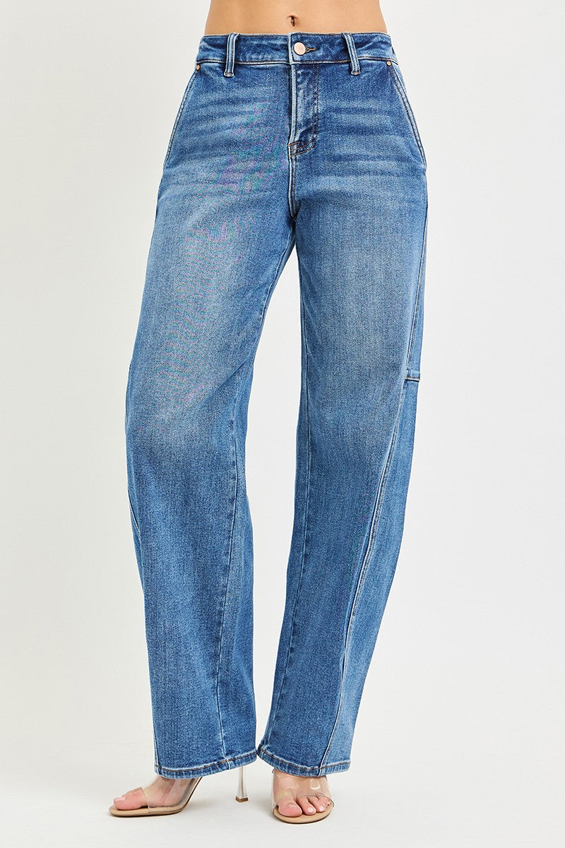 Medium-wash baggy jeans with button fly, belt loops, and relaxed straight legs