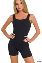 Black ribbed seamless sleeveless romper with scoop neckline and fitted shorts