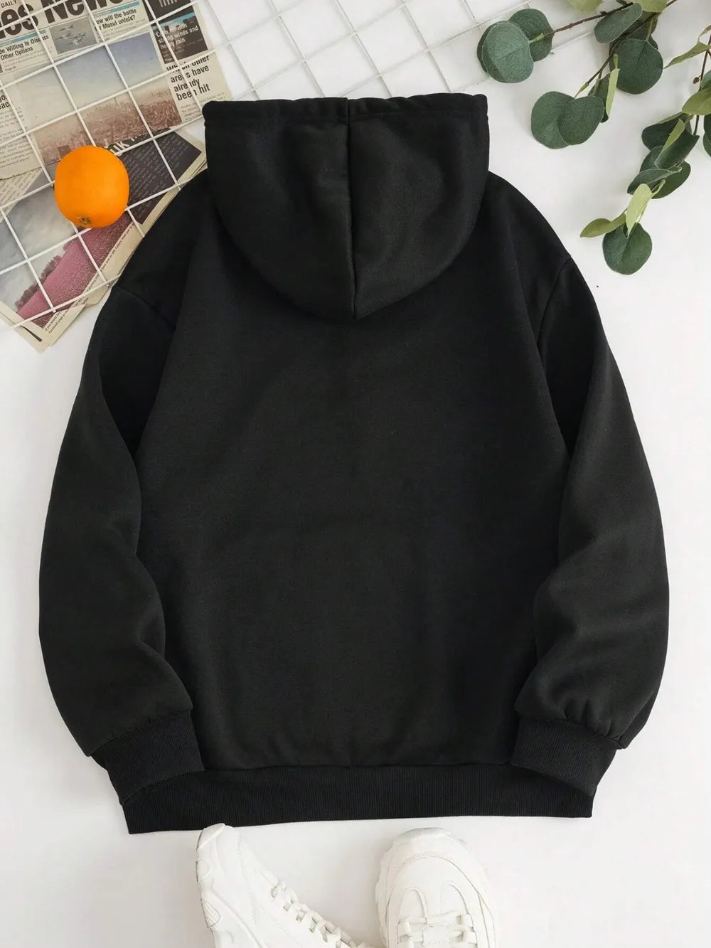 Black back view pullover hoodie with drawstring hood and ribbed hem and cuffs