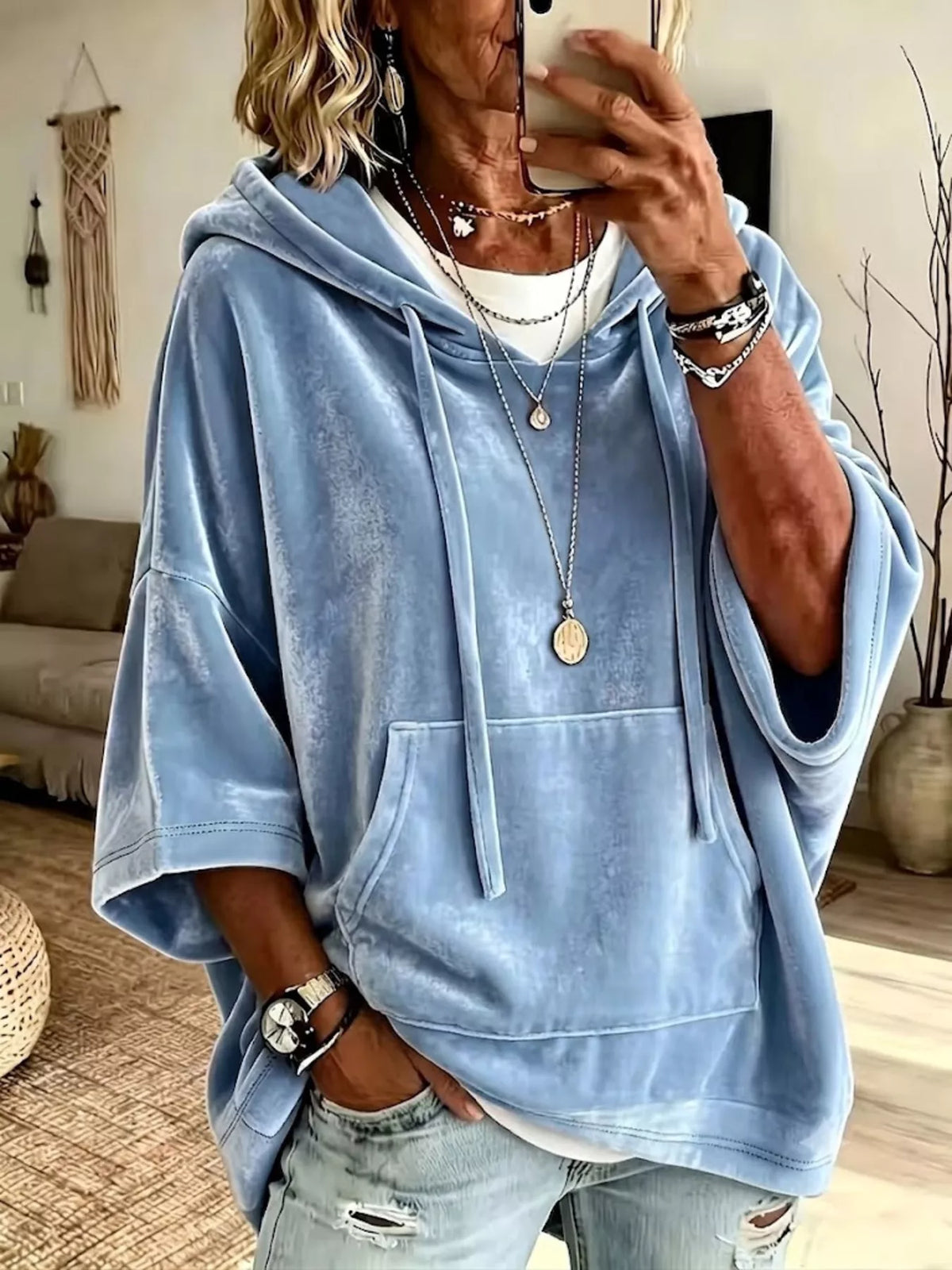 Light blue velvet kangaroo pocket hoodie with hood, drawstring, and half sleeves.