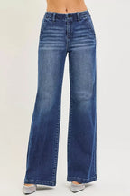 Women’s high-rise wide-leg dark blue jeans with slanted front pockets