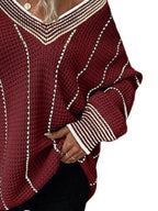 Burgundy textured knit sweater with cream vertical stripe lines and ribbed cuff details.