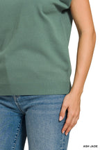 Jade green knit sweater top with ribbed cuffs and hem