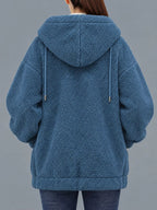 Blue fleece zip-up hoodie back view with hood and side pocket openings