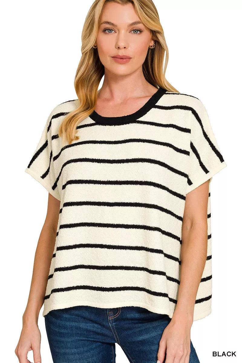 Striped oversize sweater top with short sleeves, black and cream horizontal stripes