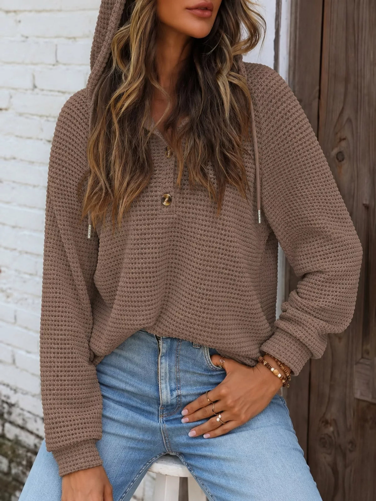 Taupe brown waffle-knit hoodie with hood, two-button front, and drawstring ties