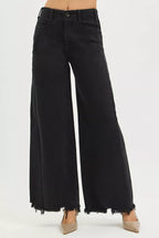 Black high-rise palazzo jeans, frayed hem at the ankles, front button closure