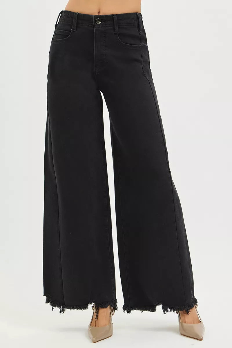Black high-rise palazzo jeans, frayed hem at the ankles, front button closure