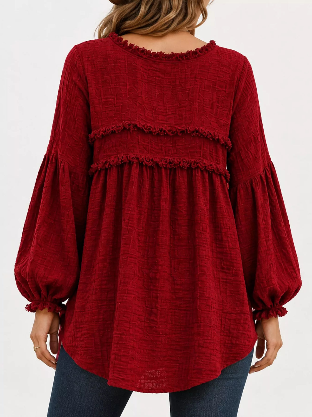 Red peplum blouse back view with frayed trim yoke and balloon sleeves