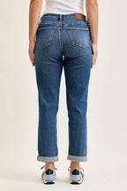 Women’s mid-rise boyfriend jeans with front whiskering and cuffed ankle hem