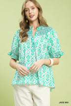 Turquoise boho smocked puff-sleeve blouse with teal geometric print, V-neck