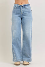 Light wash mid-rise wide-leg jeans with fold-over waistband