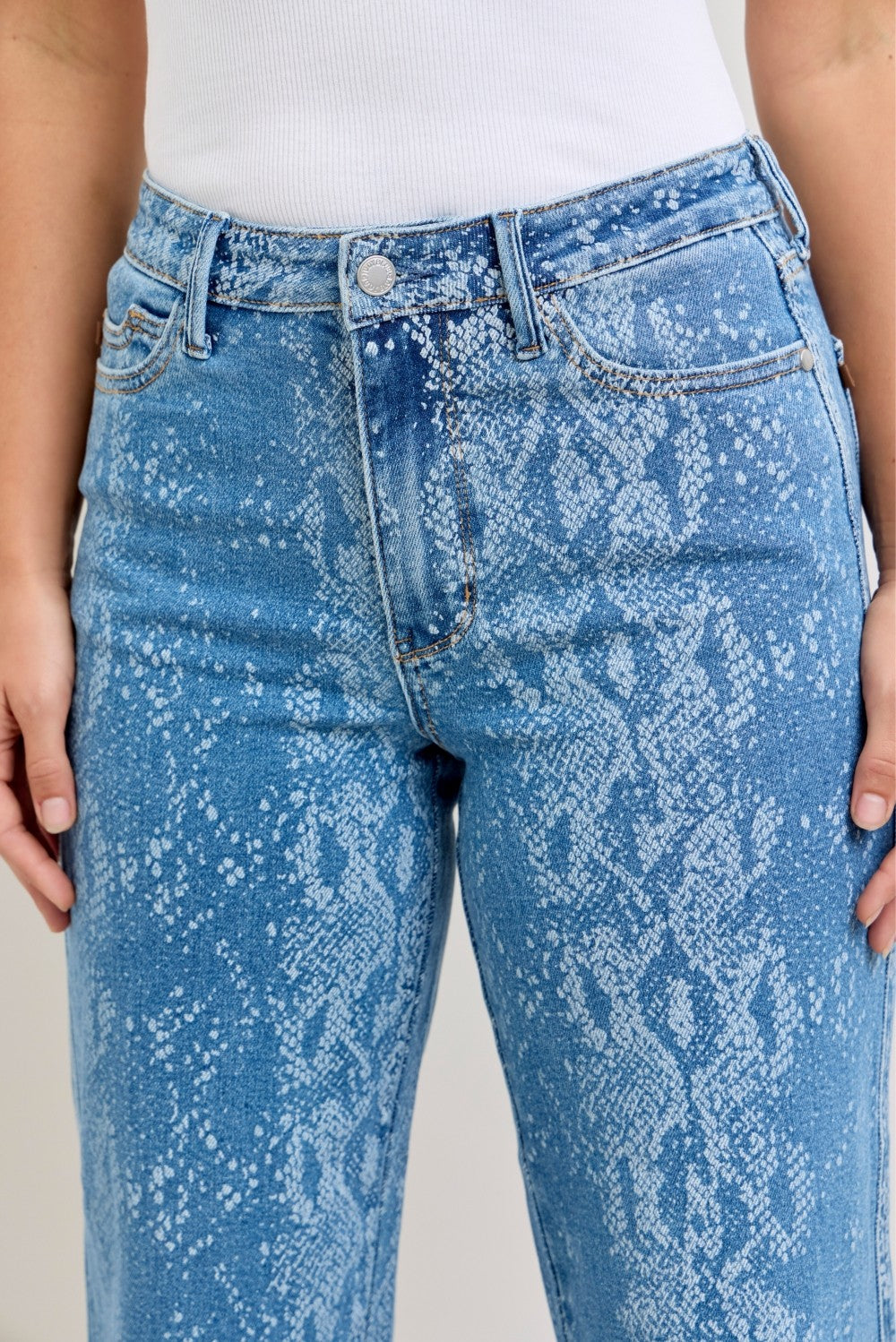 Light blue high-rise ankle wide-leg jeans with snake-print front